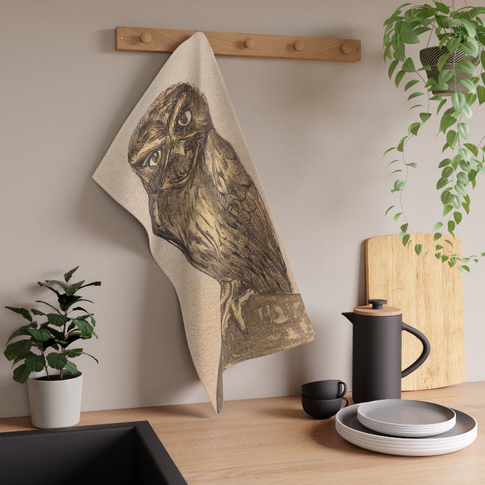 Frowning owl vintage illustration tea towel hanging on kitchen hook